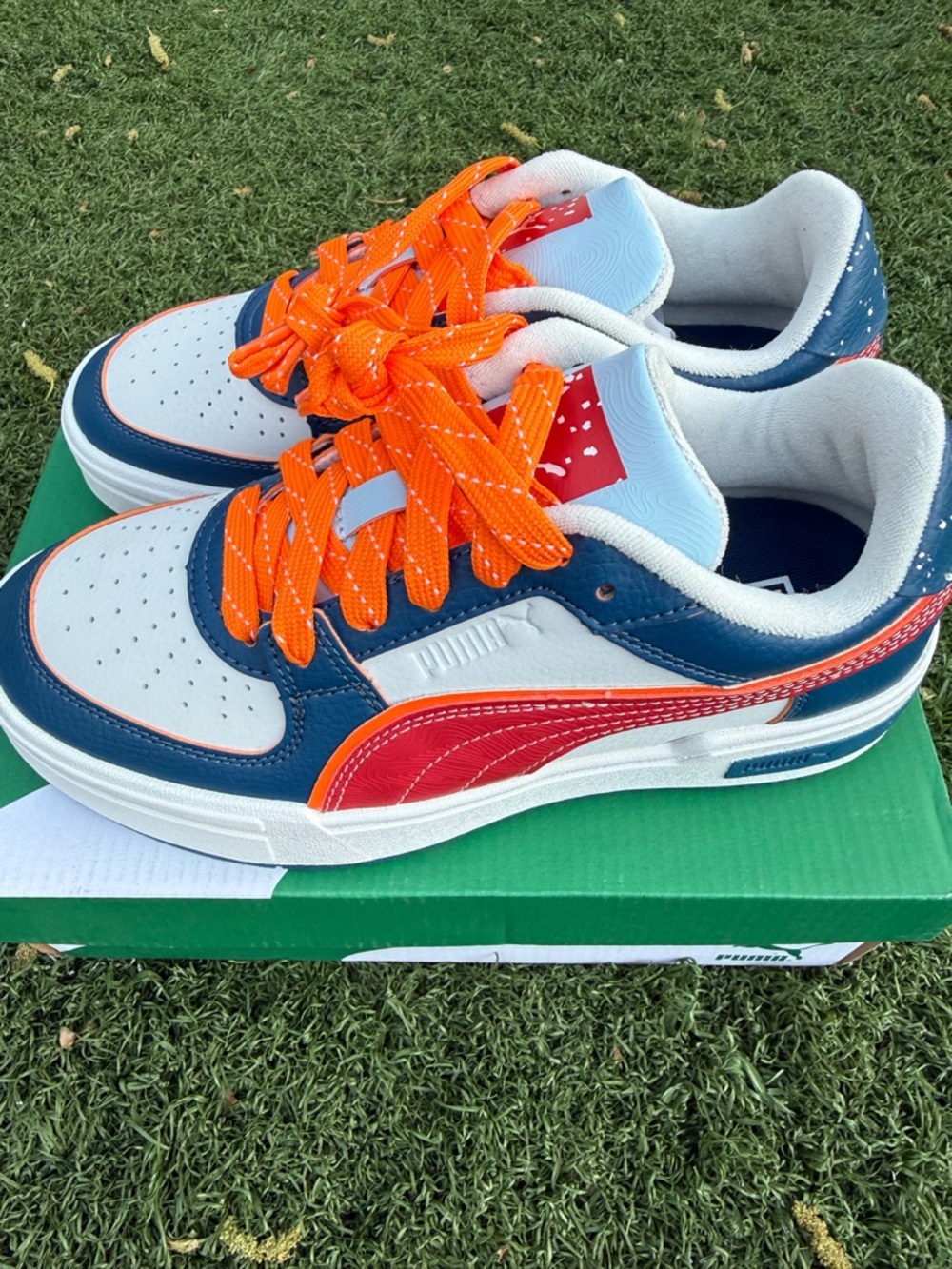 Puma Juniors Low-Top Sneakers in Orange, Red & Blue